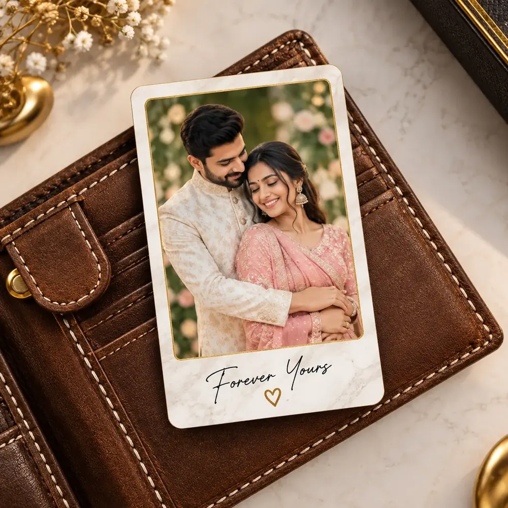 Metal photo wallet card tucked into a brown leather wallet, printed with a couple’s portrait and “Forever Yours” — Siri Print World, Palakollu
