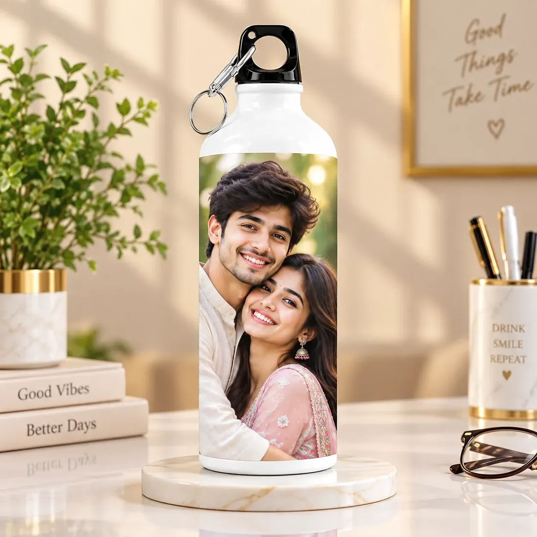 White aluminium sipper bottle with a carabiner cap, printed all round with a couple’s photograph — Siri Print World, Palakollu